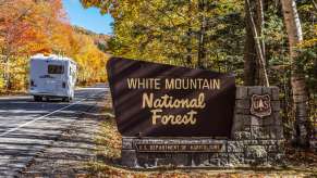 An RV driving through a national park