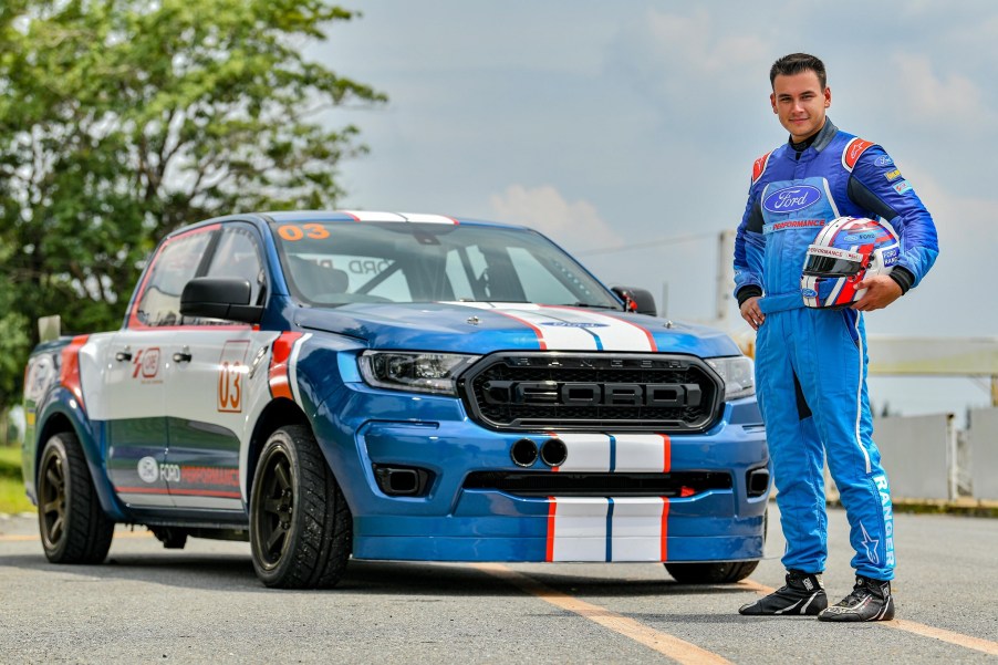 Sandy Stuvik with the blue-and-white Super Pickup Ford Ranger racing truck