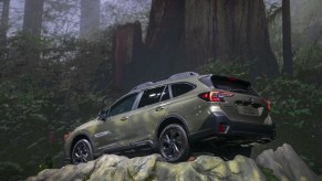 A Subaru Outback on display at an auto show