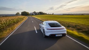 A photo of the Porsche Taycan outdoors.