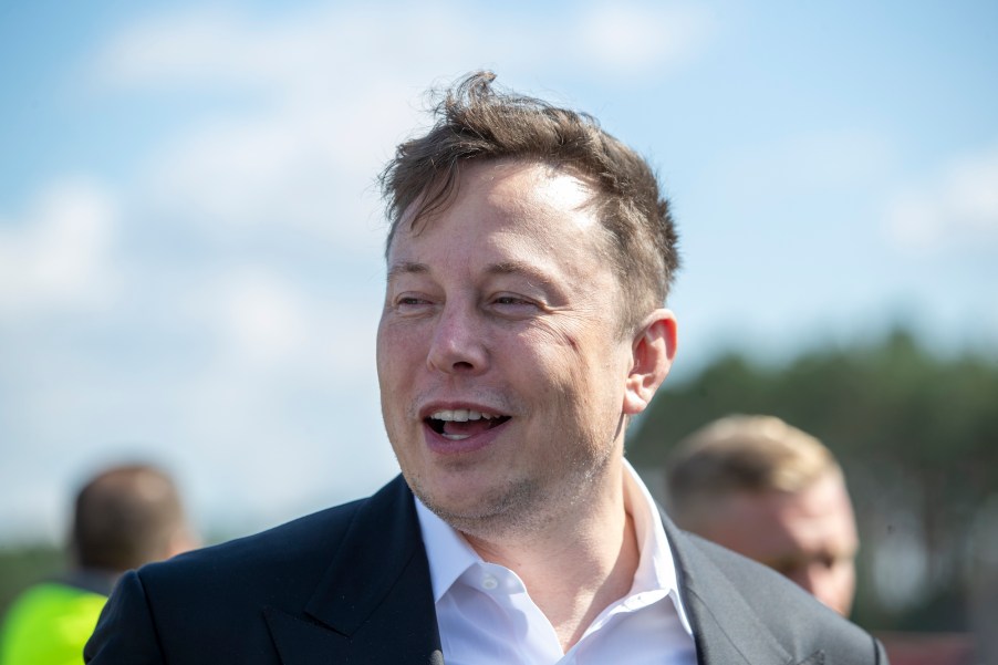 Tesla head Elon Musk talks to the press as he arrives to to have a look at the construction site of the new Tesla Gigafactory near Berlin on September 03, 2020, near Gruenheide, Germany.