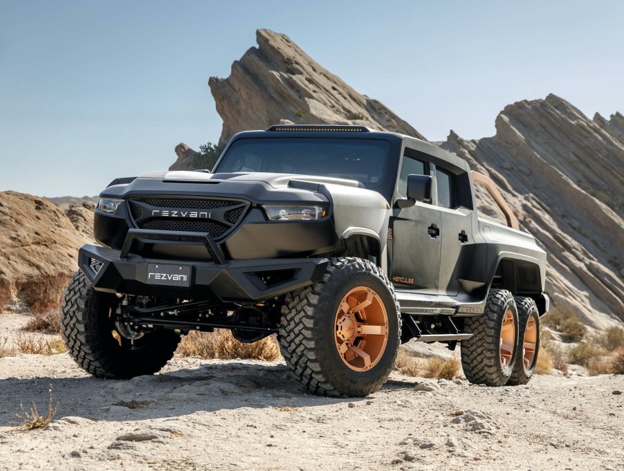 A photo of the Rezvani Hercules 6X6 in the desert.