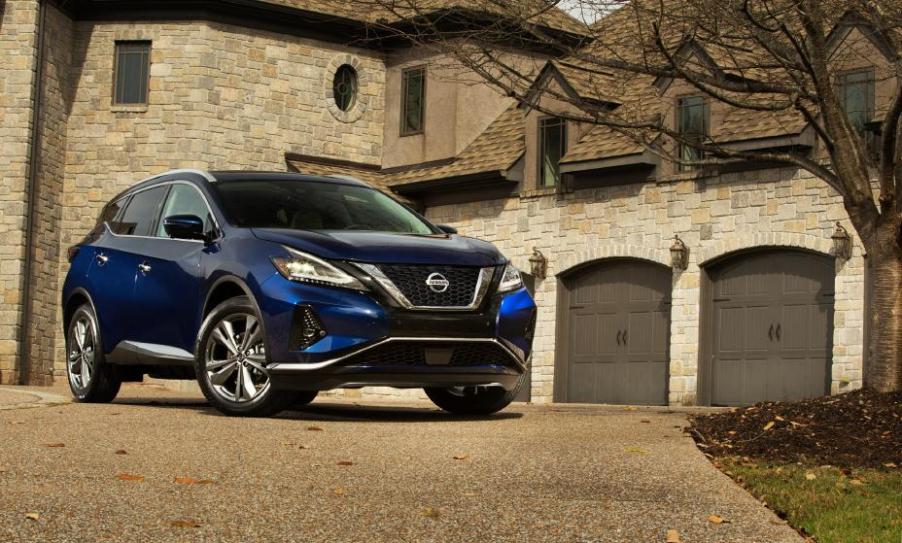 2021 Nissan Murano parked in front of an affluent home