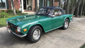 A green 1974 Triumph TR6