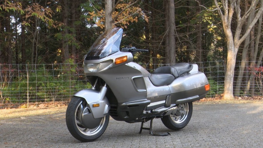 A gray 1990 Honda PC800 Pacific Coast