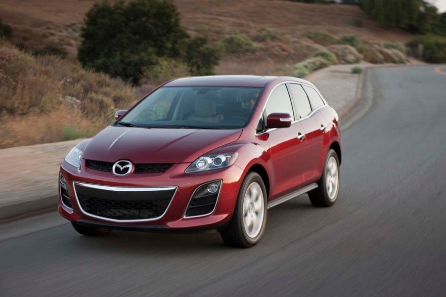 A red Mazda CX-7 on the track.