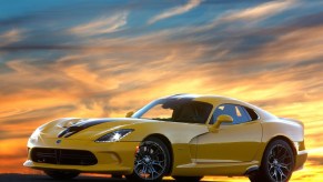 A yellow 2013 SRT Viper at sunset