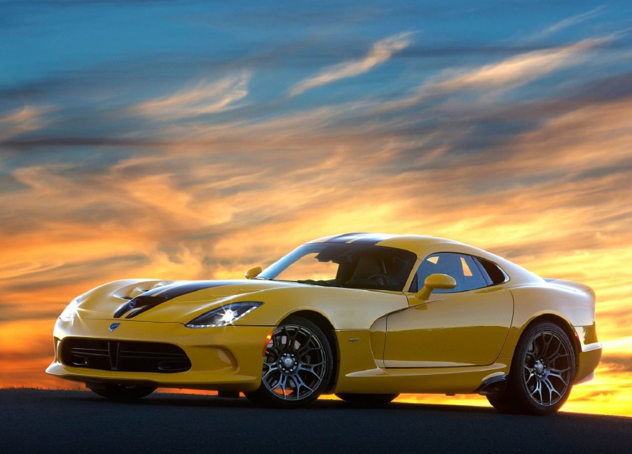 A yellow 2013 SRT Viper at sunset