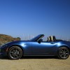 A blue 2019 Mazda MX-5 Miata parked on display