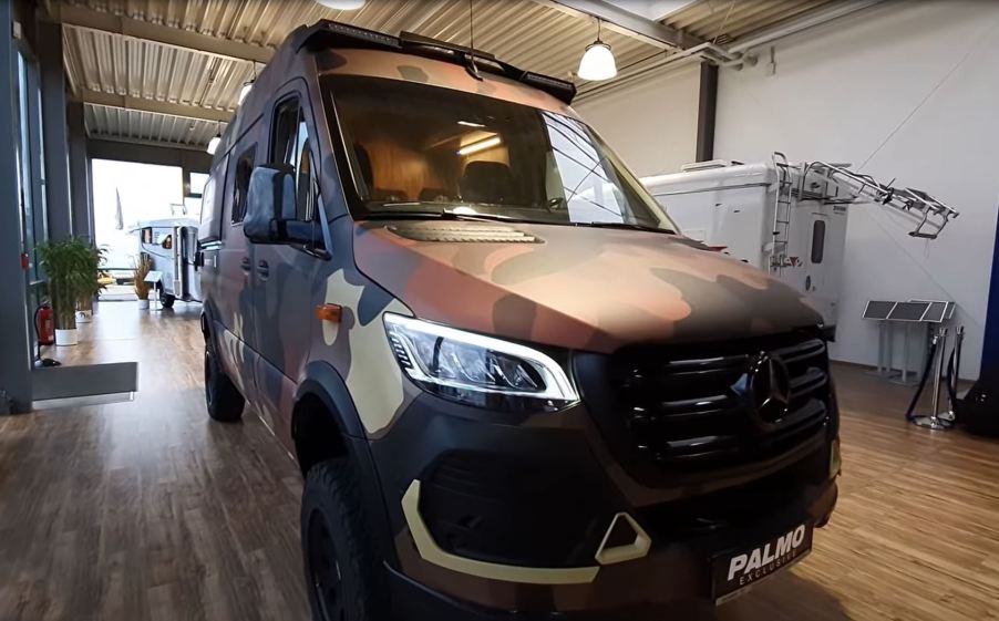 A camouflaged 2021 Hymer Grand Canyon RSX offroad RV