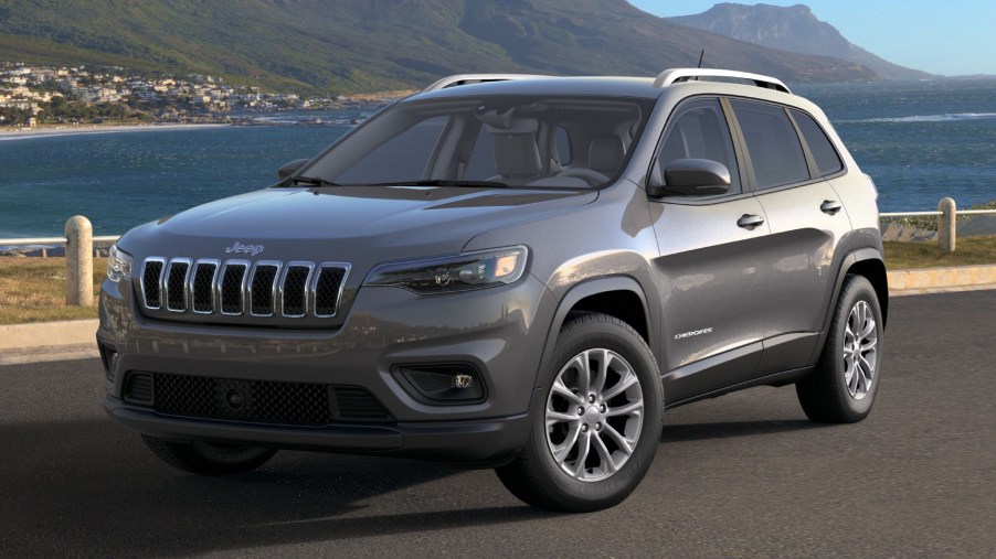 A grey 2021 Jeep Cherokee parked on display