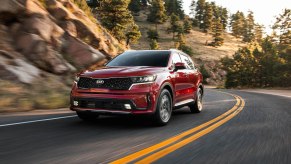 2021 Kia Sorento Hybrid driving around a bend