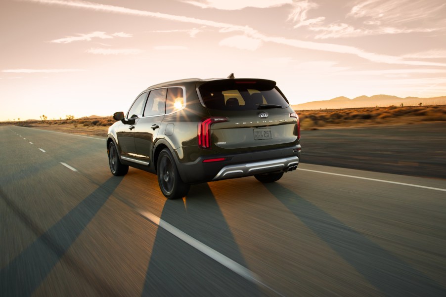 2021 Kia Telluride driving down an empty road