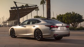 A silver 2021 Lexus LS parked on display