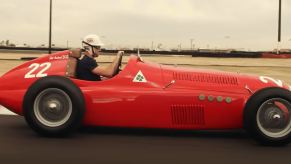 A profile view of a red Alfa Romeo racecar