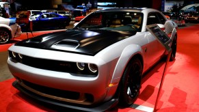 A Dodge Challenger on display at an auto show