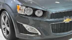 A Chevy Sonic on display at an auto show