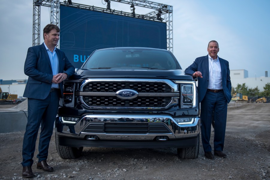 Ford CEO Jim Farley, left, and Executive Chairman of Ford Bill Ford pose for a photo with the 2021 Ford F-150 King Ranch Truck