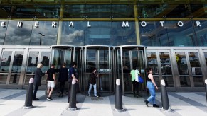 Visitors are seen at the General Motors world headquarters office in Detroit's Renaissance Center