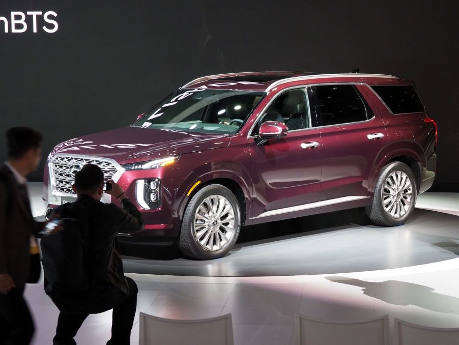 An attendee photographs the 2020 Hyundai Palisade SUV