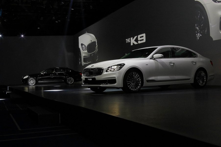 Kia Motor Company New Sedan Vehicle The K9 displayed on the show stage during an Unveil Event at Hotel's Grand Ballroom in Seoul, South Korea. the K9 will be available with two V6 engine choices and a V8, but the K900 in the U.S. will only get the 3.3-liter biturbo V6 from the Stinger