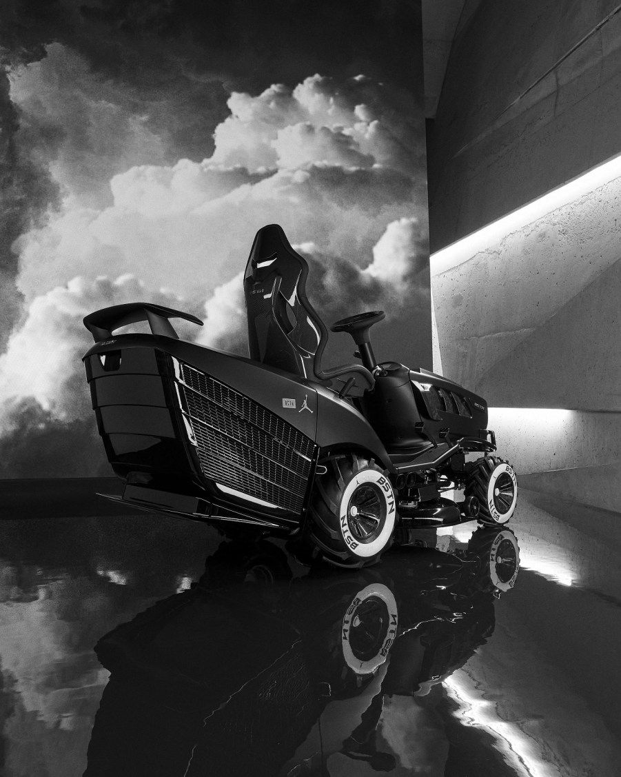 The rear 3/4 view of the black Mansory BSTN GT XI mower