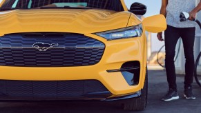 An image of a Ford Mustang Mach-E parked up at the top of the mountains.