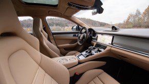 Tan interior of the 2021 Panamera Turbo S E-Hybrid Sport Turismo in Night Blue Metallic