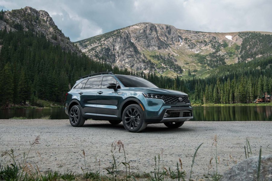 The 2021 Kia Sorento X-Line parked in front of mountains