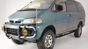 A turquoise 1994 Mitsubishi Delica Space Gear LWB 4x4