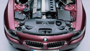 A burgundy 2004 BMW Z4 showing its M54 inline-6 engine