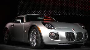 A silver 2009 Pontiac Solstice Coupe is unveiled on March 19, 2008, at the New York International Auto Show.