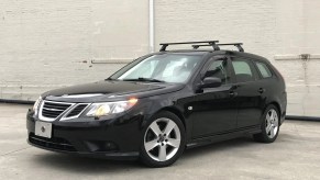 A black 2009 Saab 9-3 SportCombi 2.0T