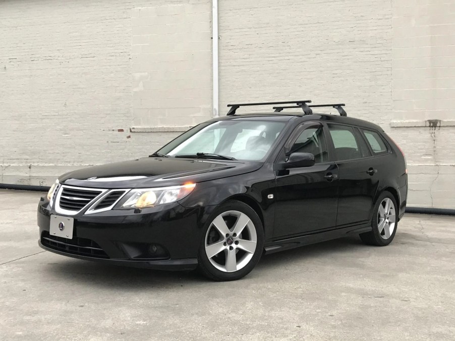 A black 2009 Saab 9-3 SportCombi 2.0T