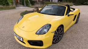 A yellow 2016 Porsche Boxster S