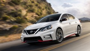 A white 2018 Nissan Sentra on the track.