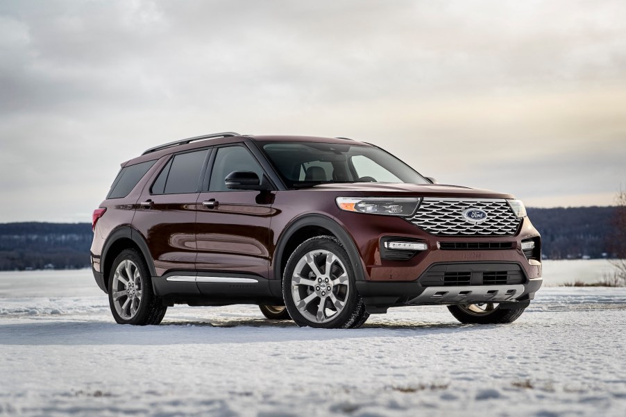 A maroon 2020 Ford Explorer Platinum parked on snow