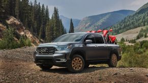 2021 Honda Ridgeline parked on dirt trail