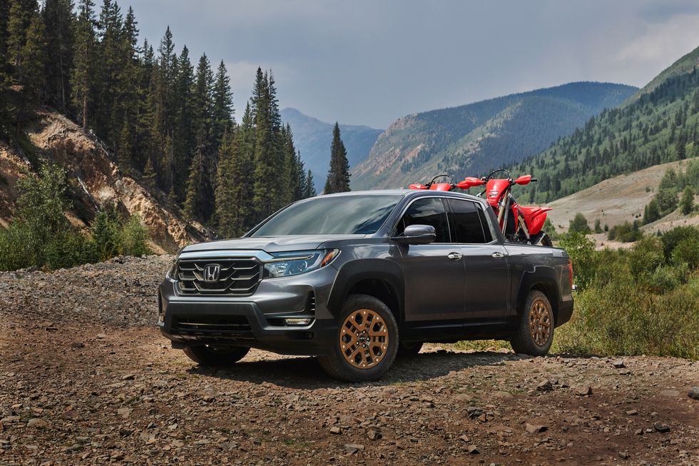 2021 Honda Ridgeline parked on dirt trail