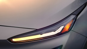 A silver 2022 Chevy Bolt EUV's front left headlight