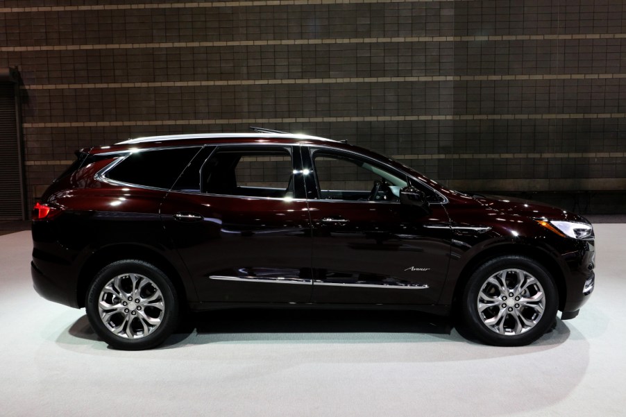 A Buick Enclave Avenir on display at an auto show