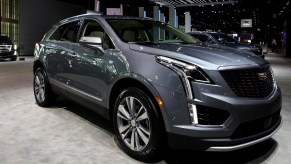 A Cadillac XT5 on display at an auto show