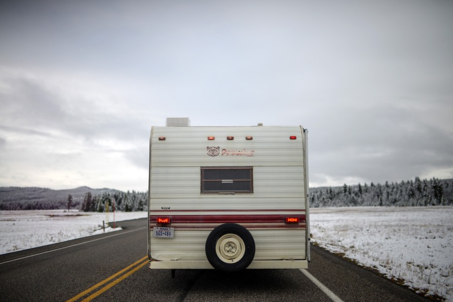 RV driving down a snow road