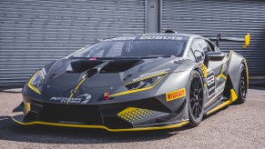 A black-and-yellow Lamborghini Huracán Super Trofeo EVO modified for the racetrack