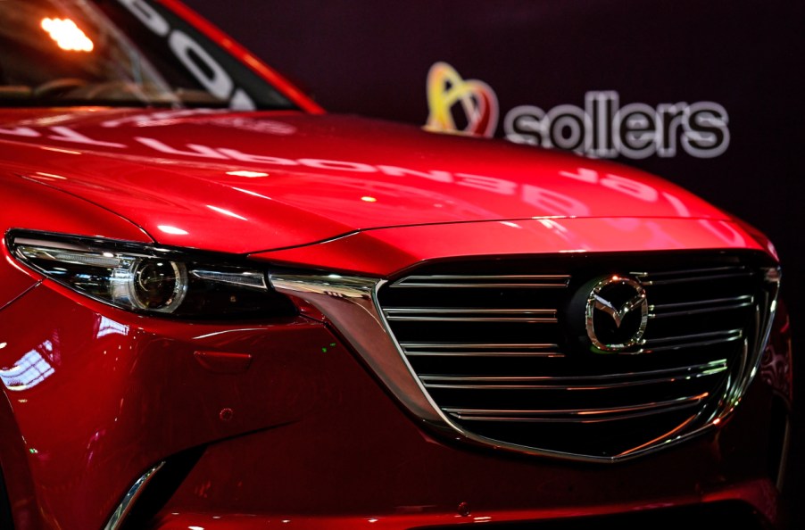 The front end of a Mazda CX-9 on display