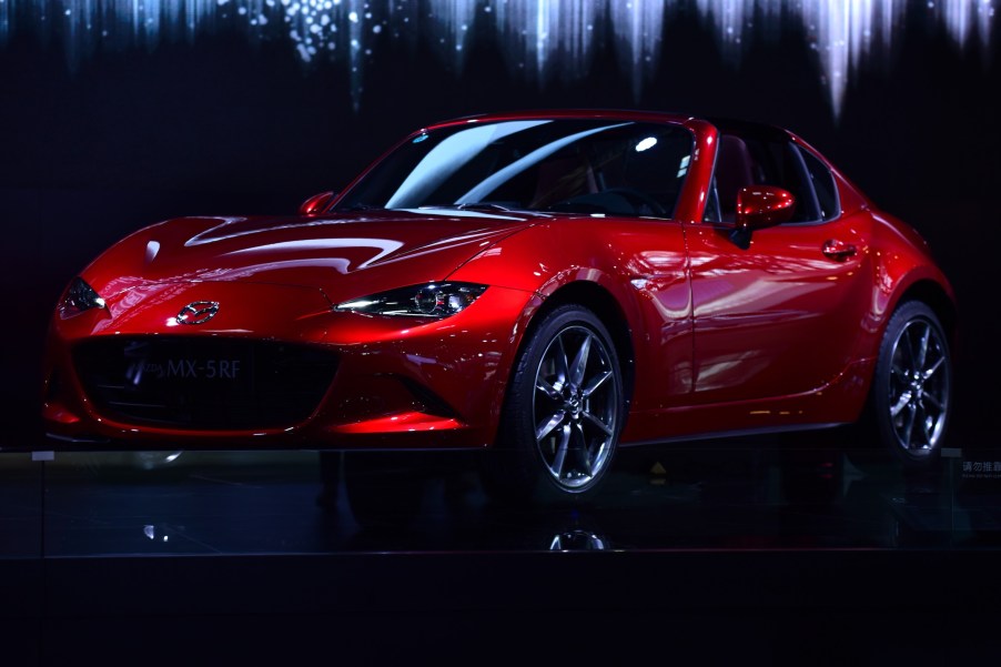 A Mazda MX-5RF car is displayed at the Beijing auto show