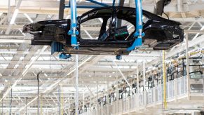 Car bodies of the new S-Class Mercedes-Benz passenger car queue at the new "Factory 56" assembly line at the Mercedes-Benz manufacturing plant | Lennart Preiss/Getty Images