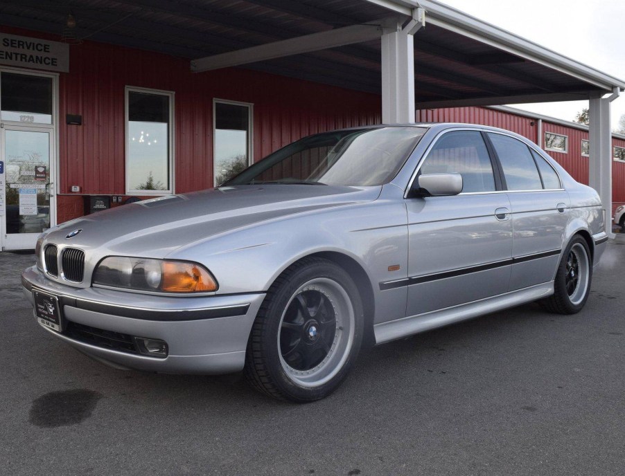 A silver modified 1997 BMW 540i M-Sport