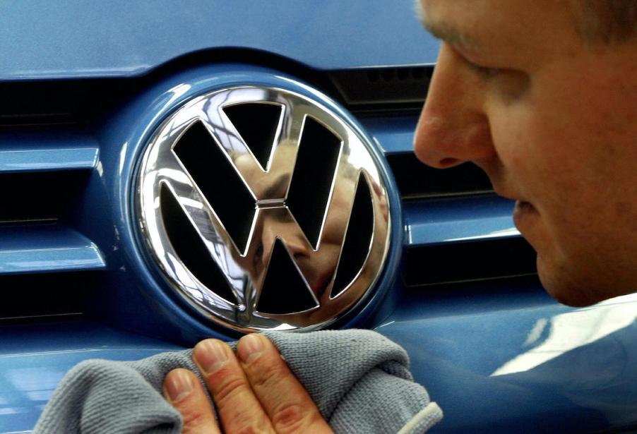 A man polishing a car