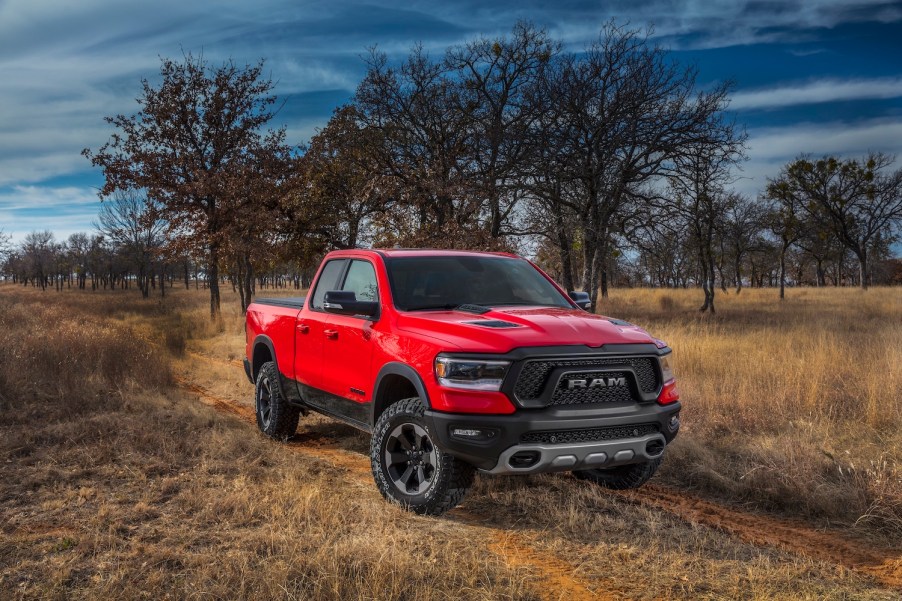 An image of a Ram 1500 parked outside on a field.